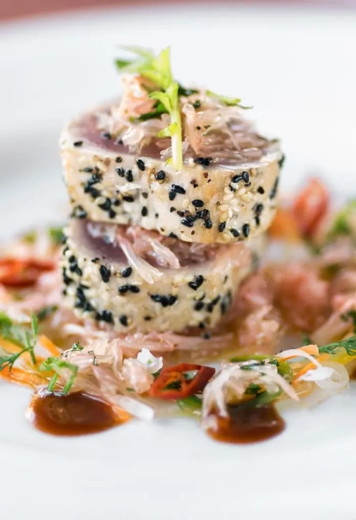 Seared tuna with vegetables and sauce.